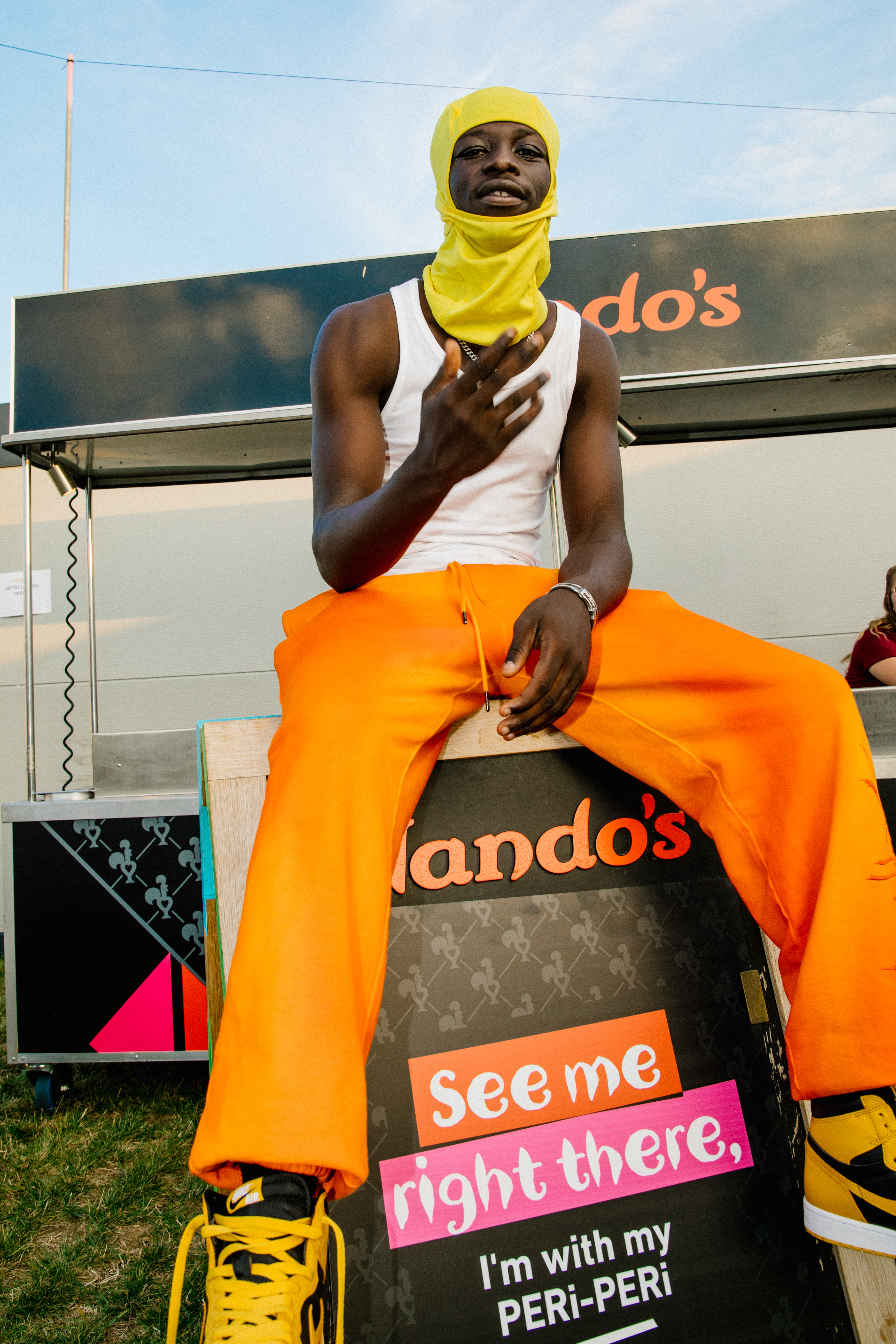 Pa Salieu snapped backstage at Strawberries and Creem Festival with a PERi-PERi nod to his mainstage performance on Day One.jpg